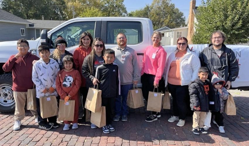 group of people in front of truck
