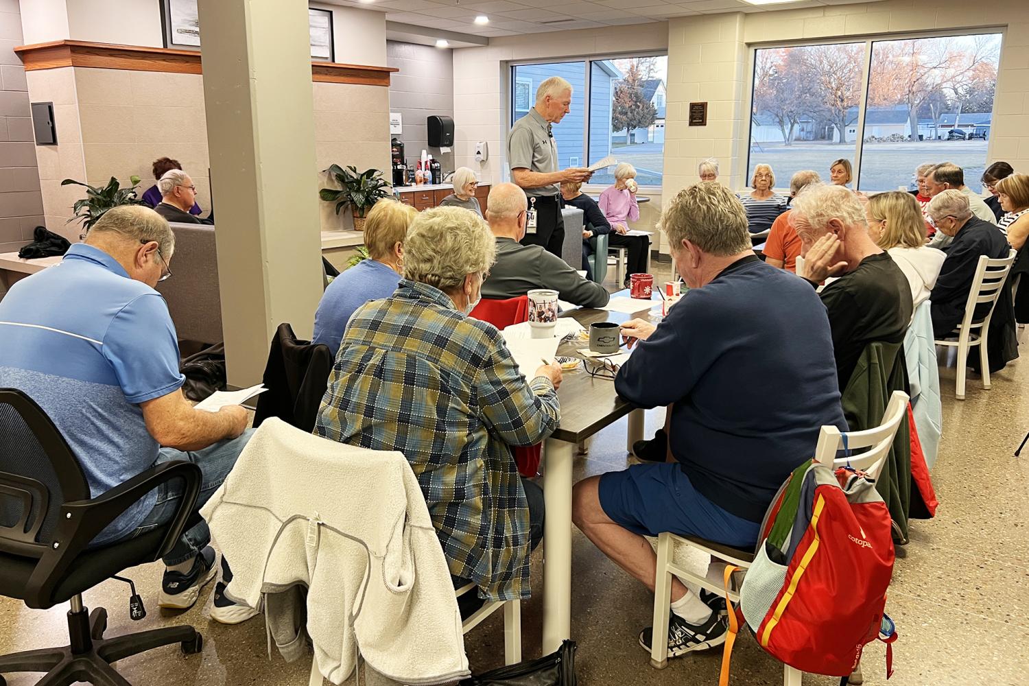 Roger Wells discusses different types of cancer at YMCA Coffee Conversations on January 6, 2026.